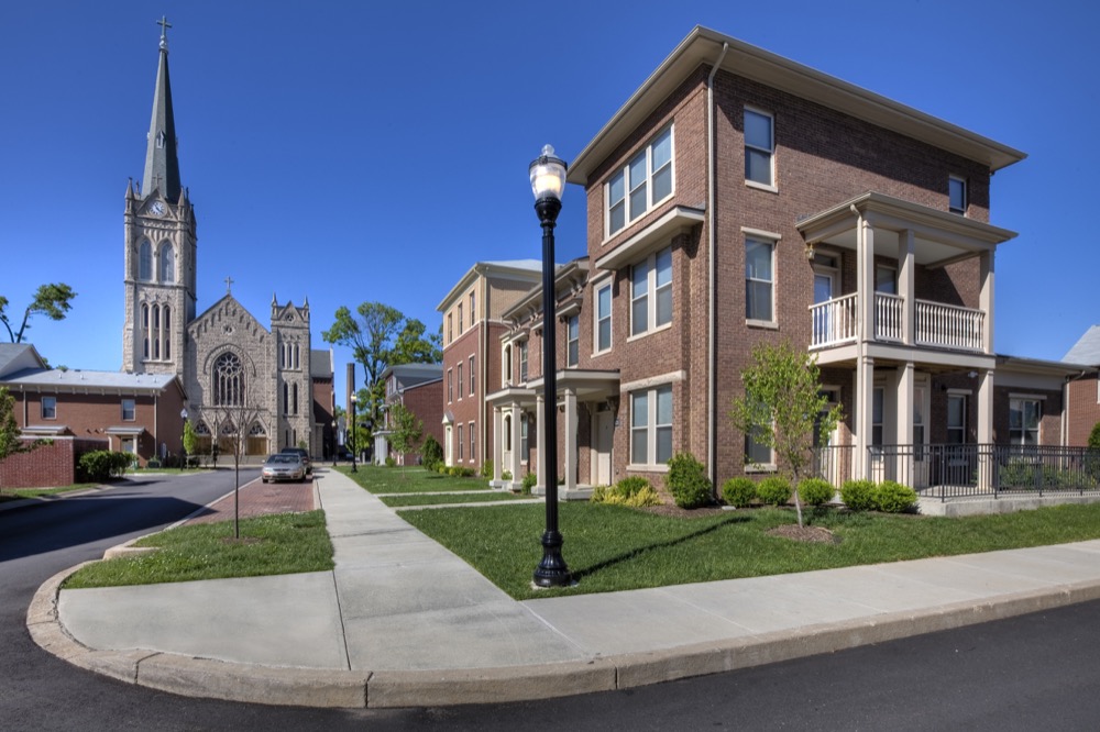 The wide range of housing types includes a mix of single family detached homes, attached homes, and small apartment buildings. The variety of housing types creates a diversity of scale and style along the neighborhood streets.