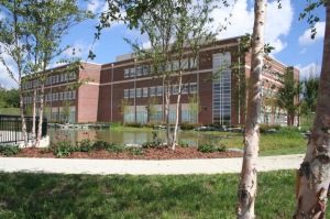 College of Business & Technology overlooking the expanded pond.