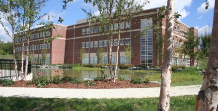 College of Business & Technology overlooking the expanded pond.