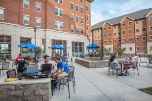 Outdoor eating and gathering spaces overlooking courtyard.
